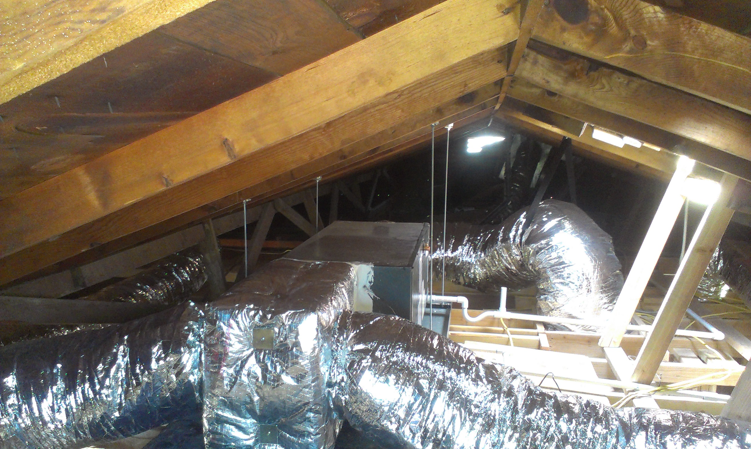 Attic installation of apartment system in central Phoenix completed